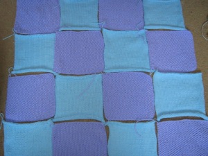 Still need 4 more squares, sew 'em all together, and add appliques ^_^